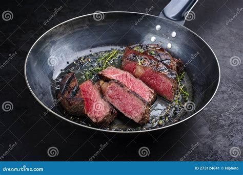 Traditional Barbecue Dry Aged Wagyu Rib Eye Beef Steaks With Herbs And