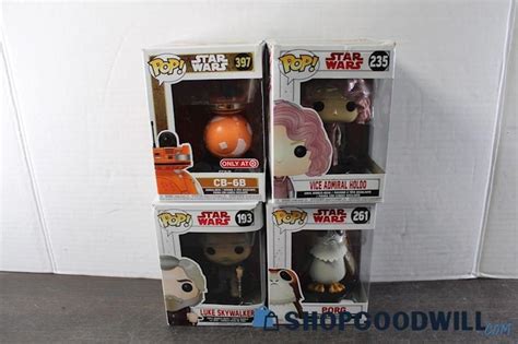 4 Assorted Star Wars Funkos Toy ShopGoodwill