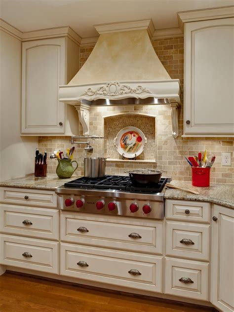 This French Country Kitchen Features A Custom Built Hood Recessed