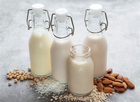 Premium Photo Bottles With Different Plant Milk Soy Almond And Oat Milk