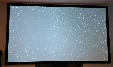 How To Fix White Dots On A Projector Screen Storables