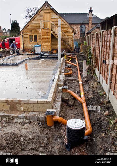 Self Building House Drainage Pipes Being Connected To Gullies Around