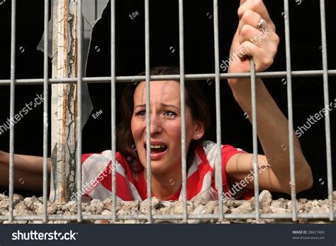 Woman Behind Bars In Old Prison Crying Stock Photo 28627468 Shutterstock