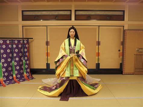 A Woman Dressed In Junihitoe At A Kimono Photography Experience