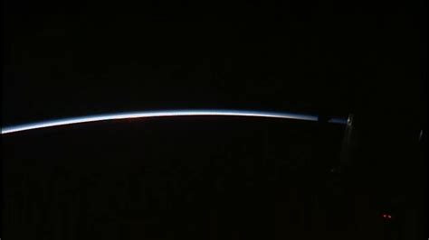 Sunrise seen from ISS. An astronaut can see 16 sunrises every day as the station orbits the ...