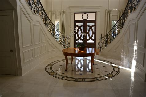 Crema Marfil Marble Tiles Stairs Countertops And Fireplace In Mansion