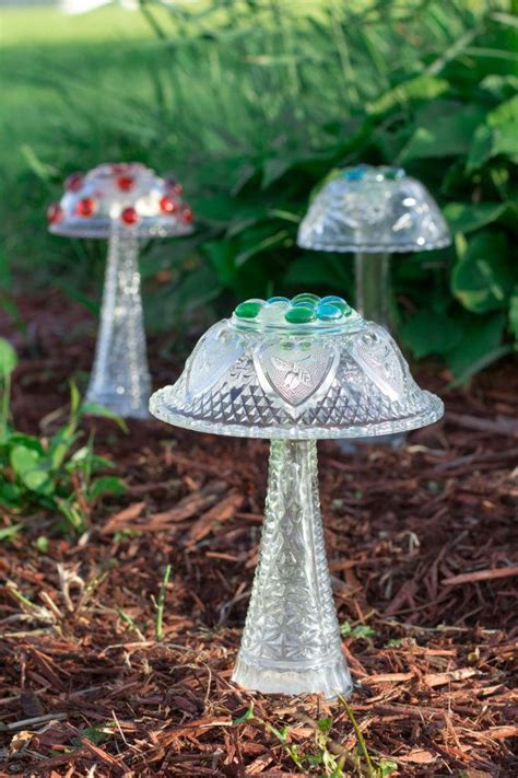 People Are Upcycling Old Glassware Into Stunning Glass Garden Mushrooms