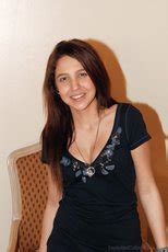 Naughty Brunette Coed Michelle Shows Her Tits Photos