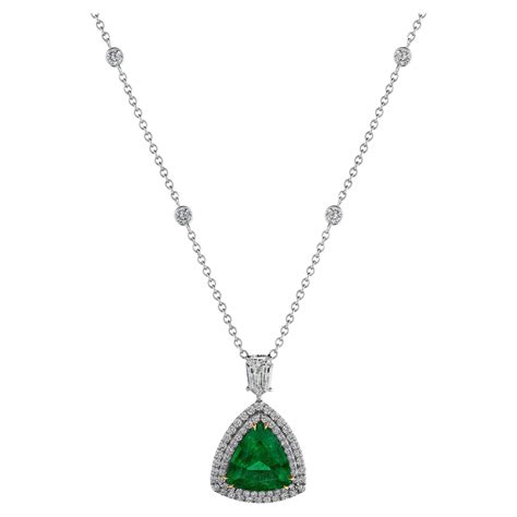 145 Carat Emerald Cut Emerald Diamond Halo Pendant For Sale At 1stdibs