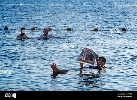 Dead sea floating reading hi-res stock photography and images - Alamy