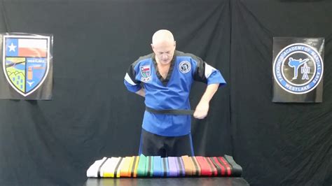 How to tie a Taekwondo Belt - YouTube