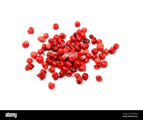 Heap Of Red Pink Peppercorns Isolated Stock Photo Alamy