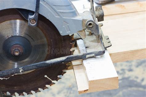 Circular saw cutting wood stock image. Image of steel - 45717985