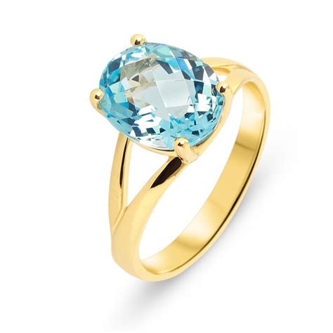 Bague Or Jaune Topaze Bleue Ovale X Mm Ref