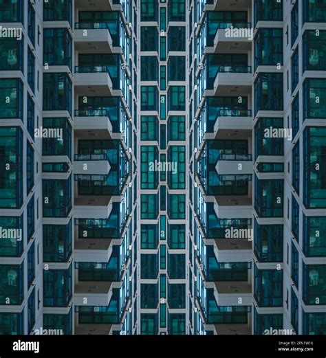 Residential Condominiums Complex Facade With Symmetrical White Concrete