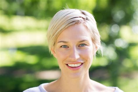 Premium Photo Pretty Blonde Smiling At Camera