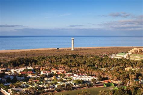 Premium Photo Large Golden Sand Beach And Lighthouse Of Morro Jable