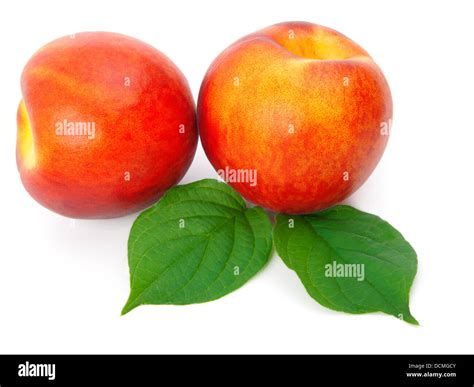 Ripe Peach With Leaves On A White Background Stock Photo Alamy