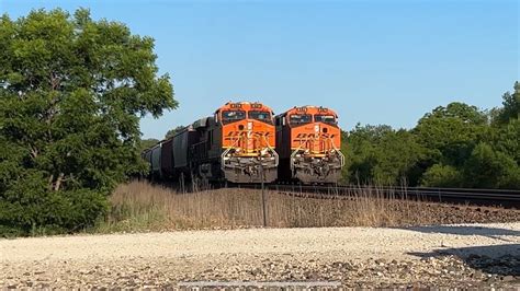 Very Fast Bnsf Grain Train Flies By Stopped Bnsf Stack Train Bnsf