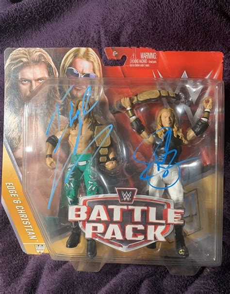 Autographed The Edge And Christian WWE Battle Pack Action Figures