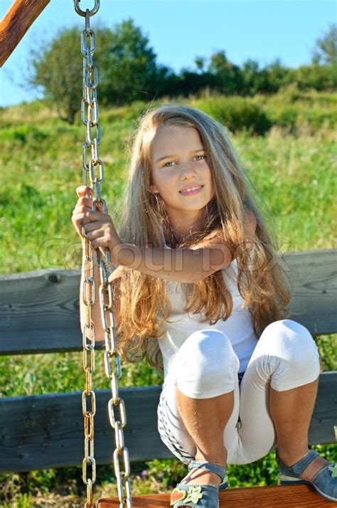 Eight Years Old Long Hair Girl Posing Outdoors Stock Photo Colourbox