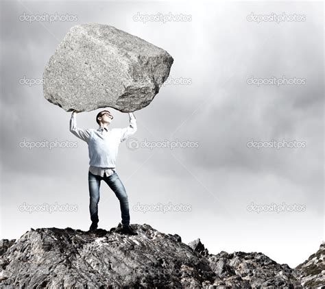 Guy Lifting Stone Stock Photo SergeyNivens 50193293