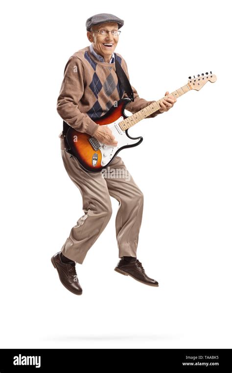 Full Length Portrait Of An Elderly Man Playing An Electric Guitar And