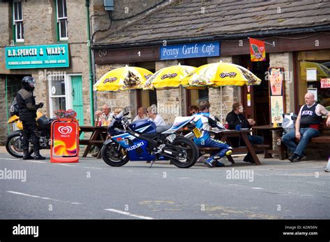 Motorcycles Bikers Resting Outside Of A Cafe Eating Drinking Talking