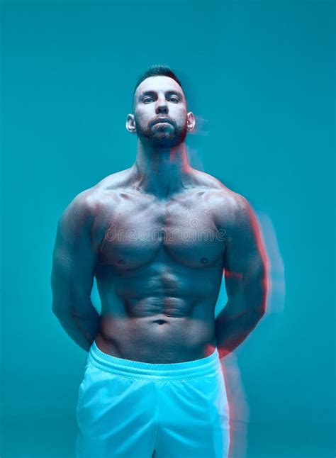 Sportive Guy Bodybuilder Showing Naked Muscular Torso Abdominal And Chest Muscles Long