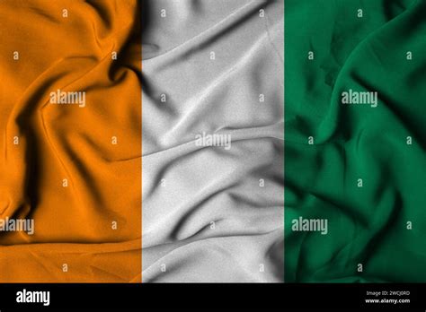 Selective Focus Of Cote D Ivoire Flag With Waving Fabric Texture D