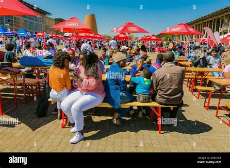 Diverse African people at a bread based street food outdoor festival Stock Photo - Alamy