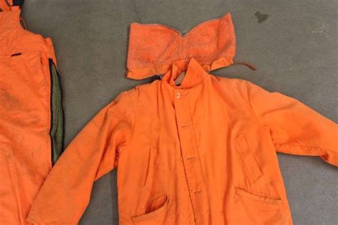 Orange Overalls, Coat, and Hats - Lee Real Estate & Auction Service