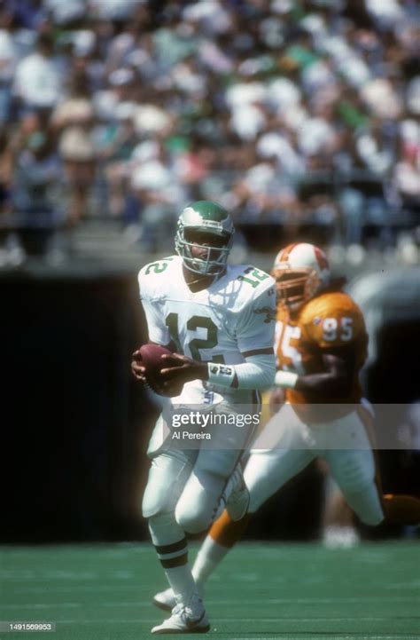 Quarterback Randall Cunningham Of The Philadelphia Eagles Rolls Out