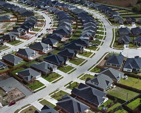 Outside Of Houston Texas Houses Line Parallel Curved Streets Photo