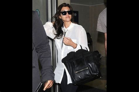 Photo Kourtney Kardashian enceinte quitte New York pour retourner à