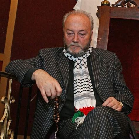 An Older Man Wearing A Suit And Tie Sitting In A Chair With His Hands