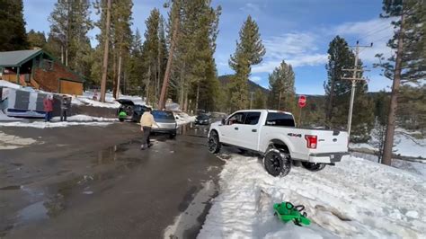 Tesla Cybertruck Owner Returns The Favor Rescues Ford F 150 Stuck In