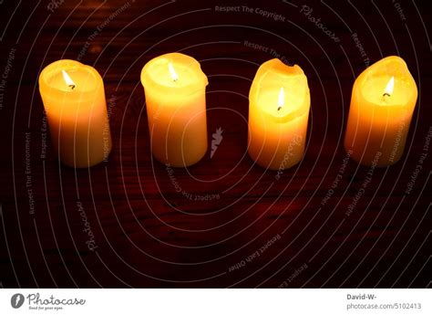 Four lighted candles for the fourth Advent - a Royalty Free Stock Photo ...