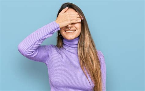 Young Hispanic Woman Wearing Casual Clothes Smiling And Laughing With