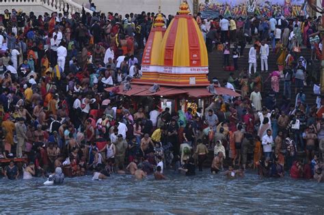 Hundreds Of Thousands Take Holy Dip In India