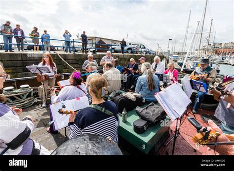Concert By The Deal Band The Sunshine Ukes On The Back Of A Tugboat