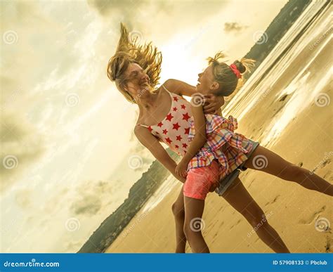 Happy Sisters Having Beach Fun Stock Image Image Of Time Happy 57908133