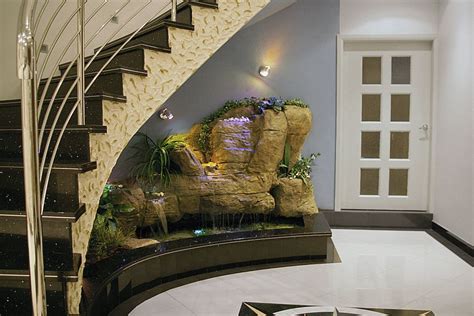 Waterfall Built Under A Curved Staircase Indoor Water Features