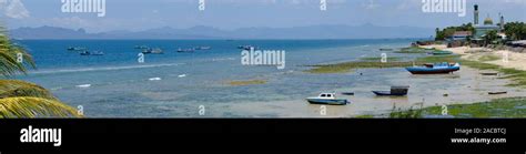 Indonesia Kupang City Coastline With Fishing Boats And Mosque Nurul