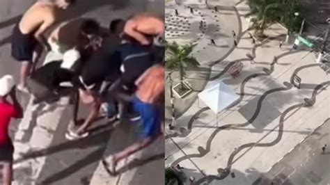 Em plena luz do dia grupo de criminosos ataca homem em praia veja vídeo