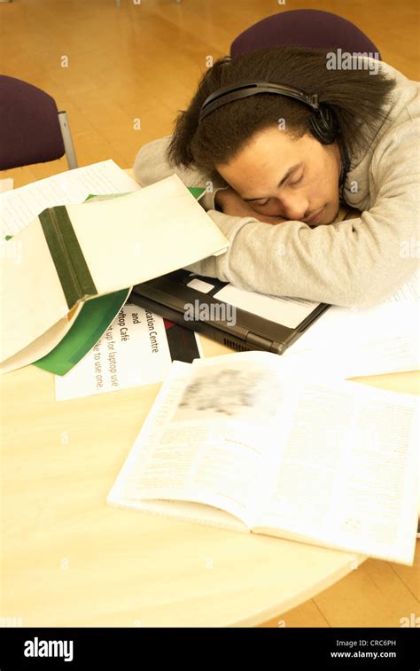 Student sleeping at desk Stock Photo - Alamy