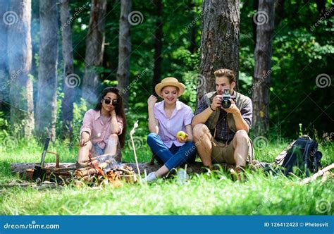 Company Hikers Relaxing At Picnic Forest Background Spend Great Time