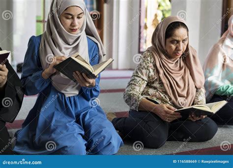 Muslim Women Reading Quran In The Mosque During The Ramadan Stock Image