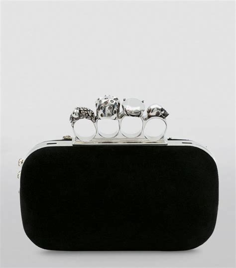 Womens Alexander McQueen Black Skull Four Ring Clutch Bag Harrods UK