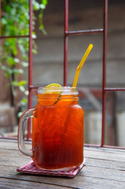 Premium Photo Iced Lemon Lime Tea On Vitage Table In A Jug